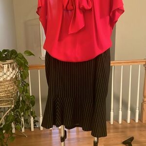 Black-and-white pinstripes skirt with flare detail, size 18.